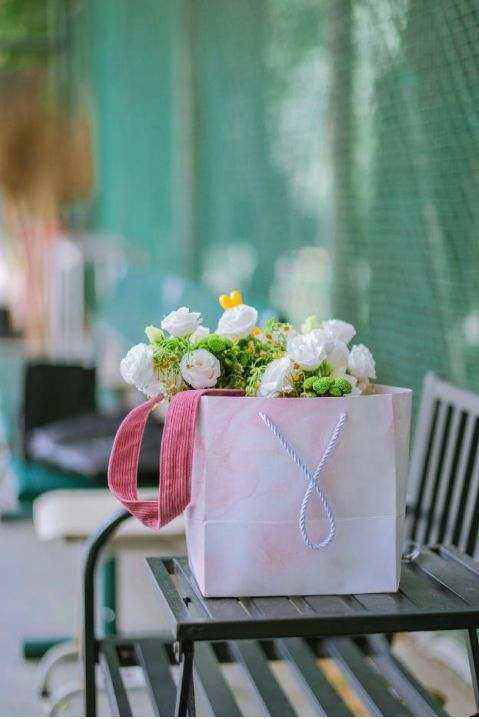 Florist preparing corporate bouquet
